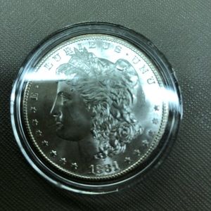 Old Morgan coins. I881 S.